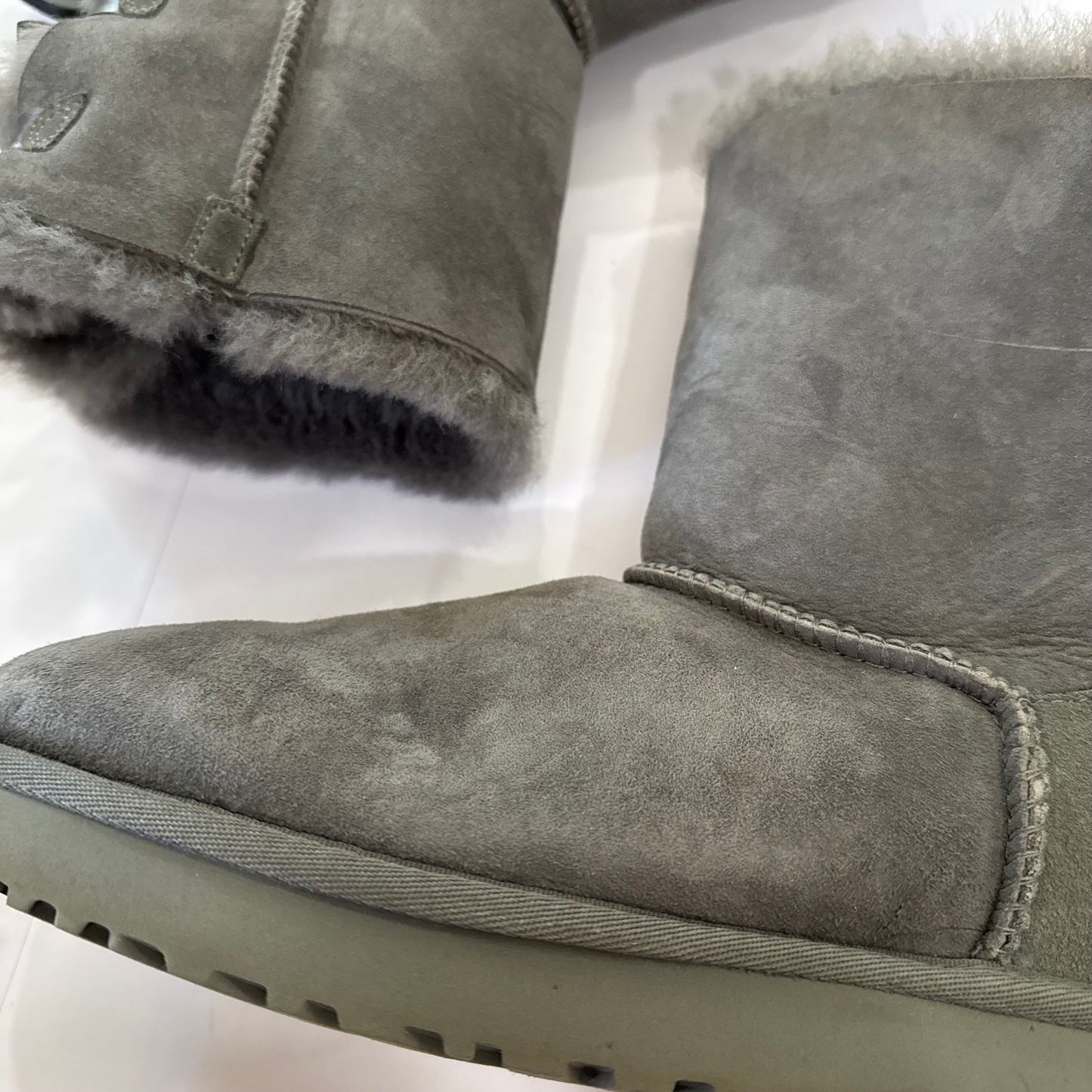 Boots Designer By Ugg In Grey, Size: 9