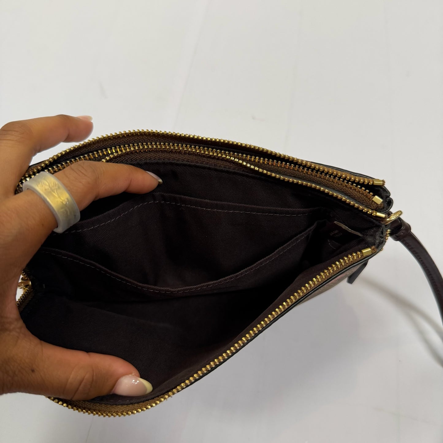 Wristlet Designer By Coach, Size: Medium